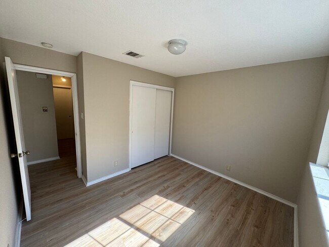 Building Photo - NEW PAINT, FLOORING, APPLIANCES & ROOF  | ...