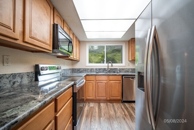 Building Photo - Available now! 2 bedroom, 1.5 Bath Townhouse at Wailuna