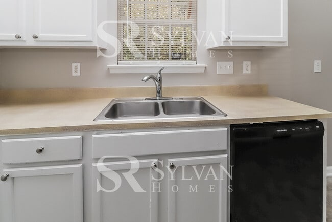 Building Photo - Turn the key. Enter. Smile. Repeat every day!