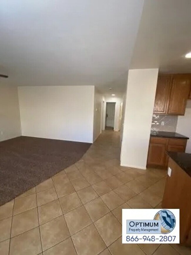 Building Photo - Spacious 4-Bedroom Home with 3-Car Garage & Downstairs Suite!