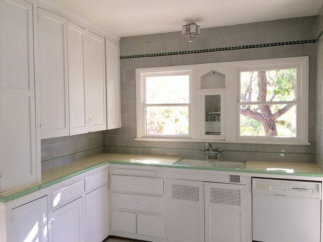 Kitchen overlooks flowering trees - 1265 Carmona Ave