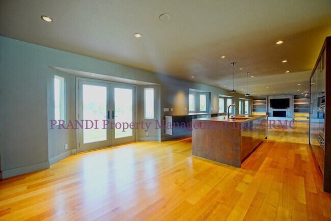 Building Photo - Sleek, Expansive, Designer Home with Priva...