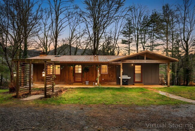 Building Photo - Rural Retreat in Candler with Bonus Room (Heat, Water, & Lawn Maintenance Included)