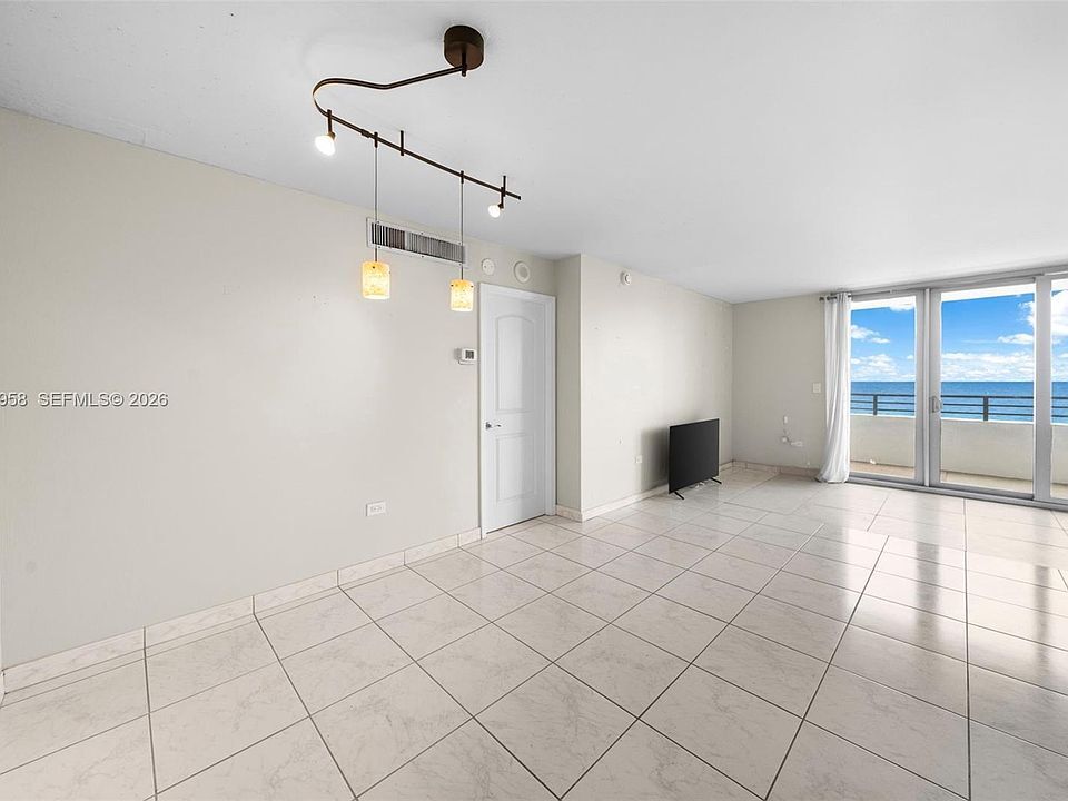 Building Photo - 5555 Collins Ave