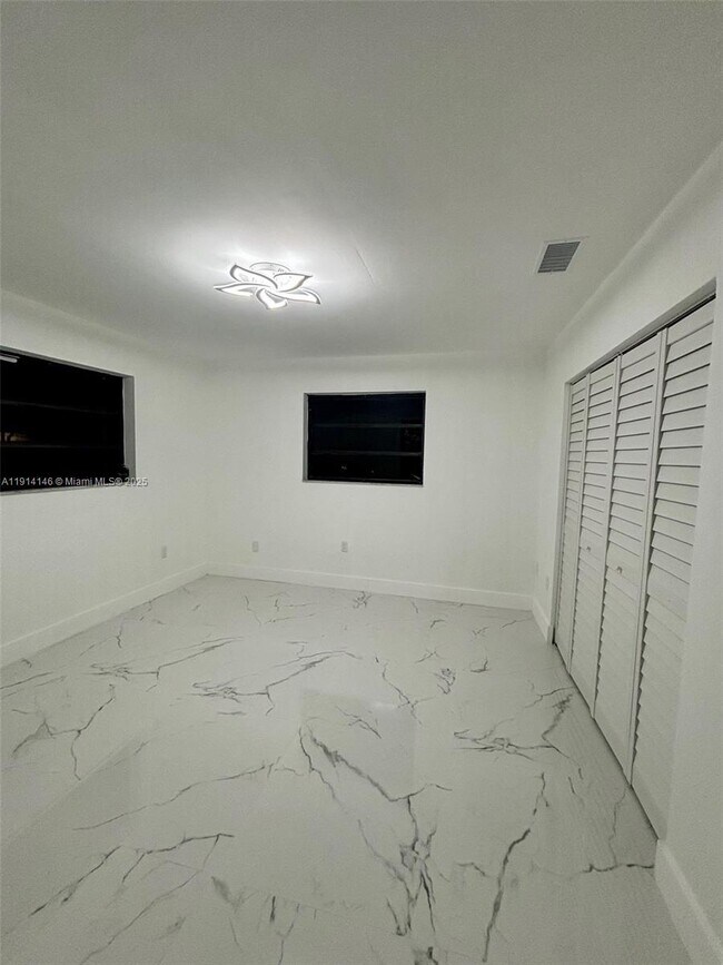 Building Photo - 1301 W 38th Pl