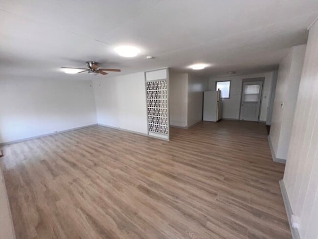 Building Photo - 5 Bedrooms | 2 Bathrooms | 3-Car Carport |...