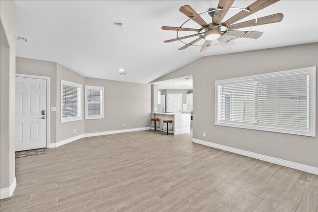 Building Photo - Stunning 3-Bedroom Townhome with Spacious Backyard & Fireplace