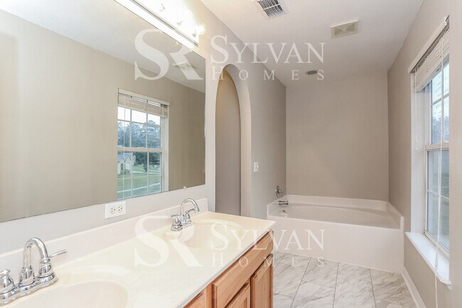 Building Photo - Your Dream Awaits: A Haven of Style and Se...