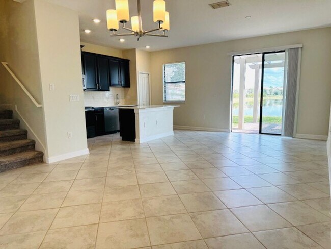 Building Photo - For Rent in ChampionsGate 3/2.5 Townhouse with Water View