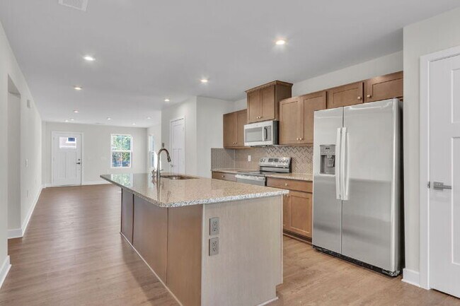 Building Photo - Charming 3-Bed Townhouse Oasis in Greenvil...