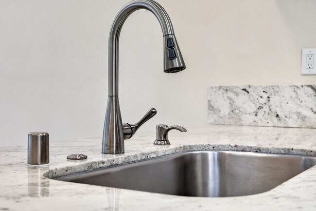 Building Photo - Updated Ground-Floor End Unit with Pool Access & No Stairs in West Roundtree!