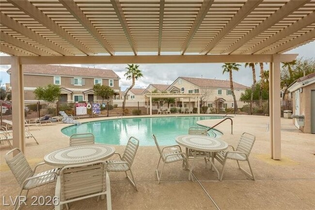 Building Photo - Cozy Gated Townhome with Private Yard, 2-Car Garage & Community Pool!