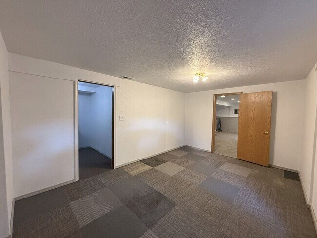 Building Photo - Cozy 4BR Home with Extra Space & Outdoor C...