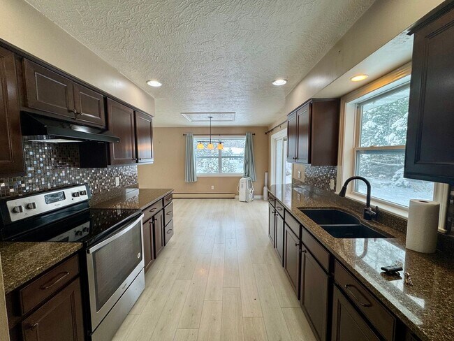 Building Photo - 4 Bedroom | 2 Bathroom Single Family Home | Renovated | Coal Valley