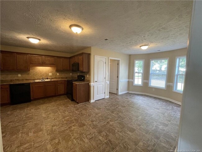 Building Photo - 5234 Woodpecker Dr