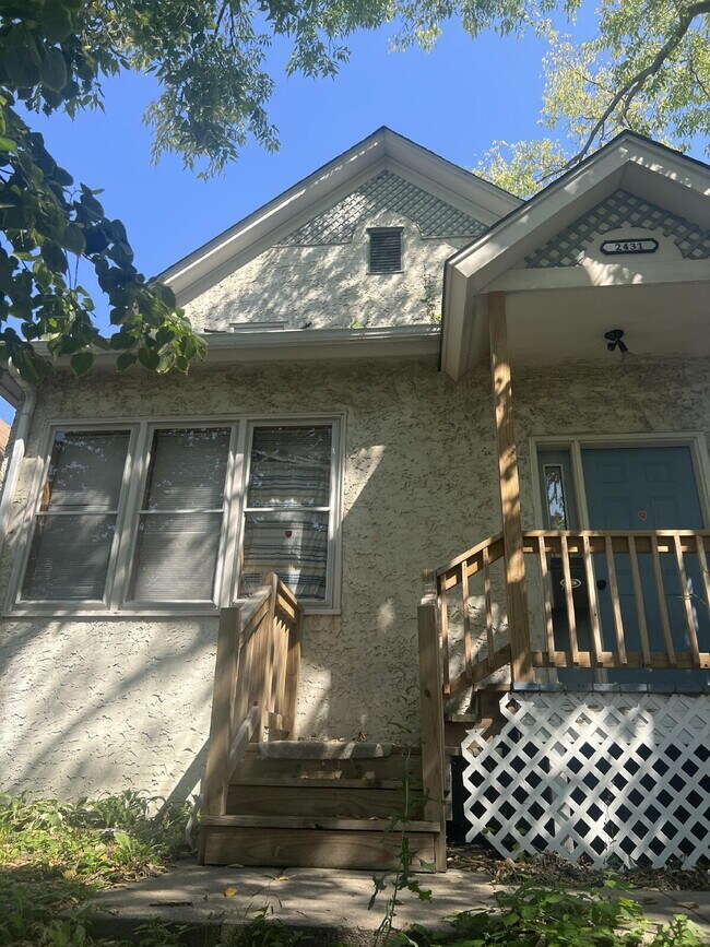 Building Photo - "Spacious 5-Bedroom Retreat with Elegant Hardwood Floors in Vibrant Minneapolis Neighborhood!"