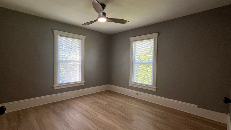 back bedroom with natural light from two directions - 2366 E 85th St