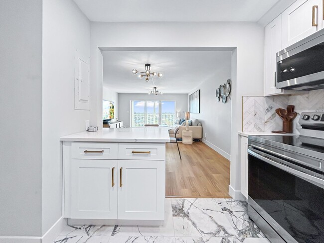 Building Photo - Available on April 15 - Stunning Furnished Waterfront Condo – 2 Beds / 2 Baths with Gulf-to-Bay V...