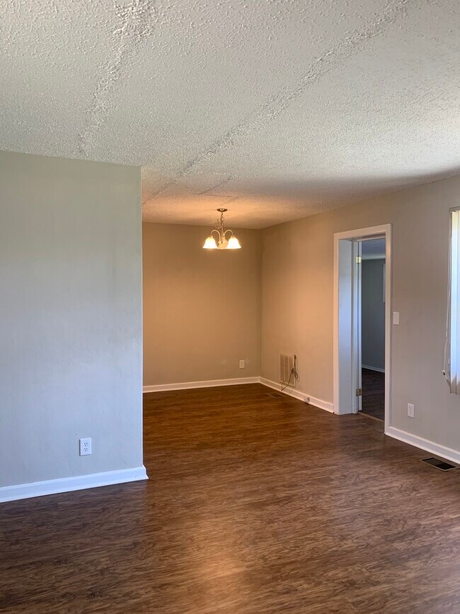 Building Photo - COMING SOON! Spacious 4 Bedroom Single-Family Home - No Carpet