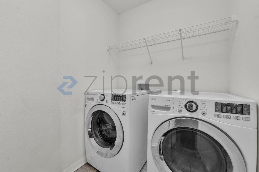 Building Photo - 9309 Stone River Pl