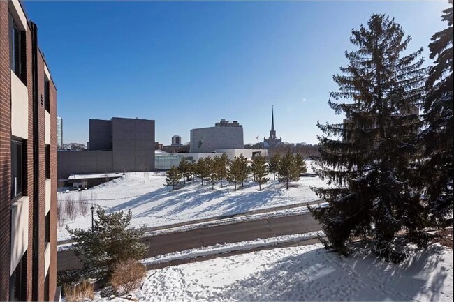 Building Photo - 1Bd/1Ba with Heated Parking, Stainless Steel Appliances, and Pool Access