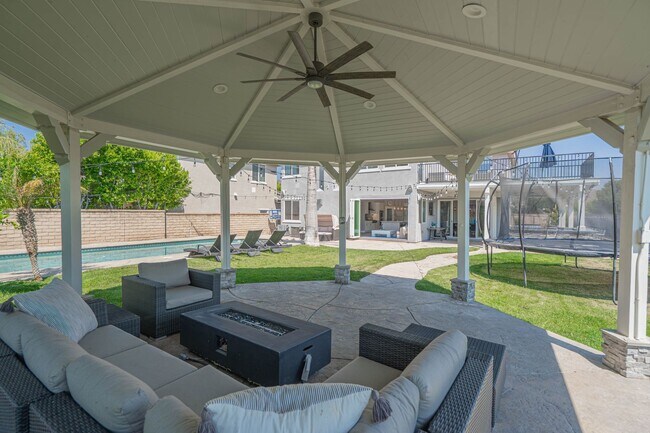 Building Photo - Spectacular 5-Bedroom Home with Pool, RV P...