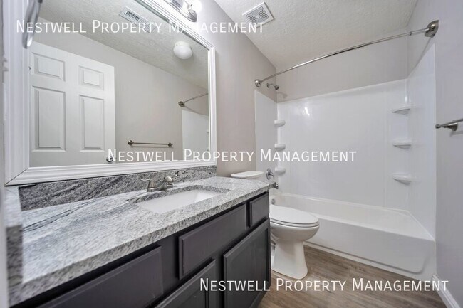 Building Photo - $250 OFF 1ST MONTHS RENT!  Mid-Level  3-be...