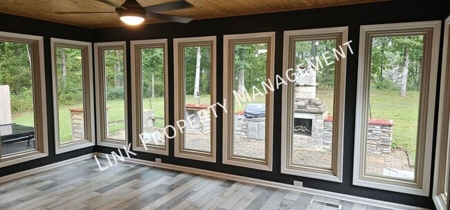 Building Photo - Exceptional 5-Bedroom Home with Luxury Out...