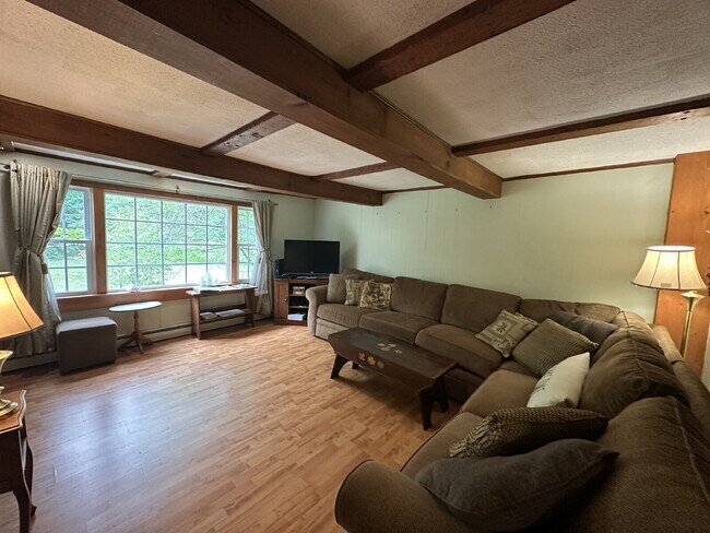 Building Photo - Charming 3BR Waterfront Retreat with Sunroom, Brick Accent & Scenic Lake Views