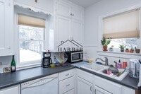 Building Photo - Updated Craftsman Living: 2BR/2BA + Den in NW Rochester
