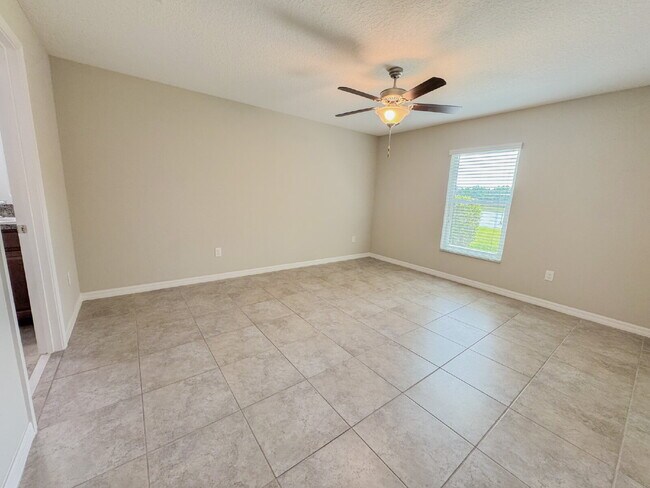 Building Photo - "Charming 3-Bedroom Home with Elegant Granite Touches in Wimauma!" Community pool! Fitness center...