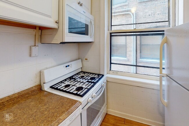 Building Photo - Evanston Fantastic Condo Near St. Francis ...