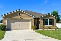 Building Photo - Stylish 4-Bedroom Home with Fenced Yard – Prime Location!