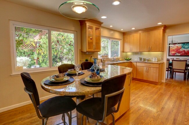 Building Photo - Executive 5BR Home with Private Backyard Retreat