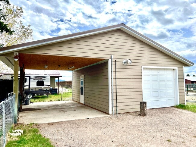 Building Photo - Pet Friendly 2 Bed 2 Bath Single Family Home With Garage, Private Deck and Big Yard!