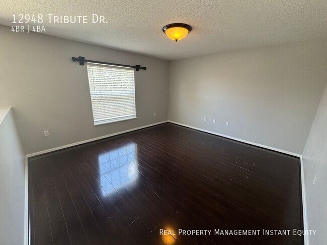 Building Photo - 12948 Tribute Dr