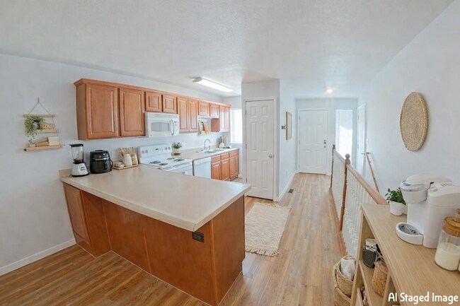 Building Photo - Backyard Deck + Attached Garage + Pet Friendly + Washer and Dryer Included! Available January Now!