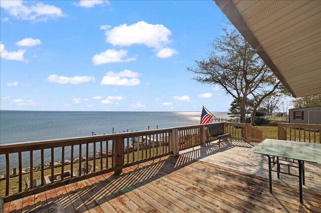 Building Photo - Stunning 4-Bedroom, 3-Bath Waterfront Home in Choctaw Beach – 140ft of Bayfront Bliss!