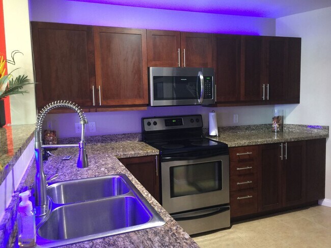 Building Photo - Beautifully Furnished Condo Right Across f...