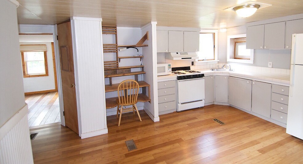 Kitchen looking towards the living room - 6201 NY-42