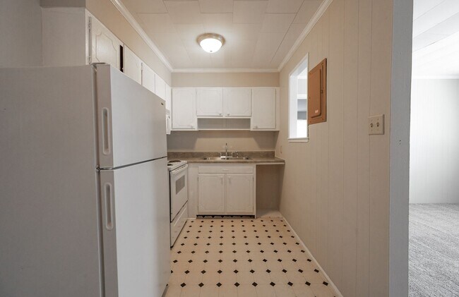 Building Photo - Cozy 1-Bedroom Condo in the Heart of Carrboro