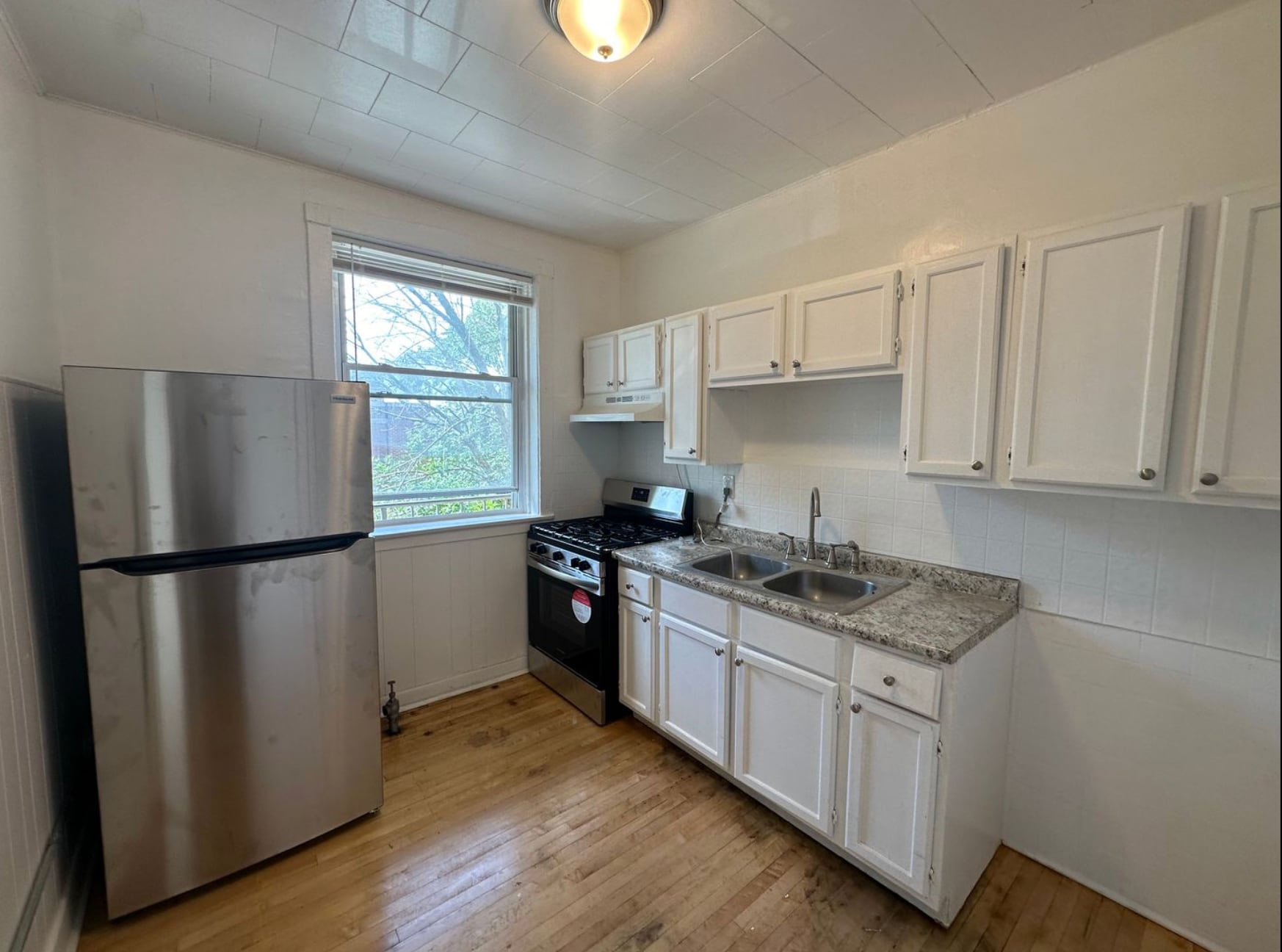 Building Photo - 4900 N Saint Louis Ave