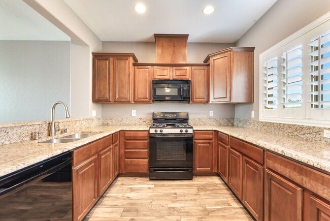 Building Photo - 3 bedroom, 2.5 bathroom Home with a 2 car garage  in  a Gated Community!