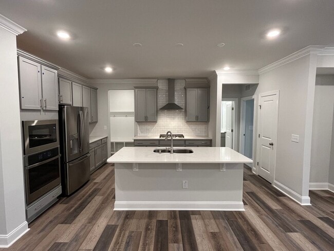 Building Photo - Newly Built 4BD, 3BA Cary Townhome with Modern Amenities and Screened-In Patio