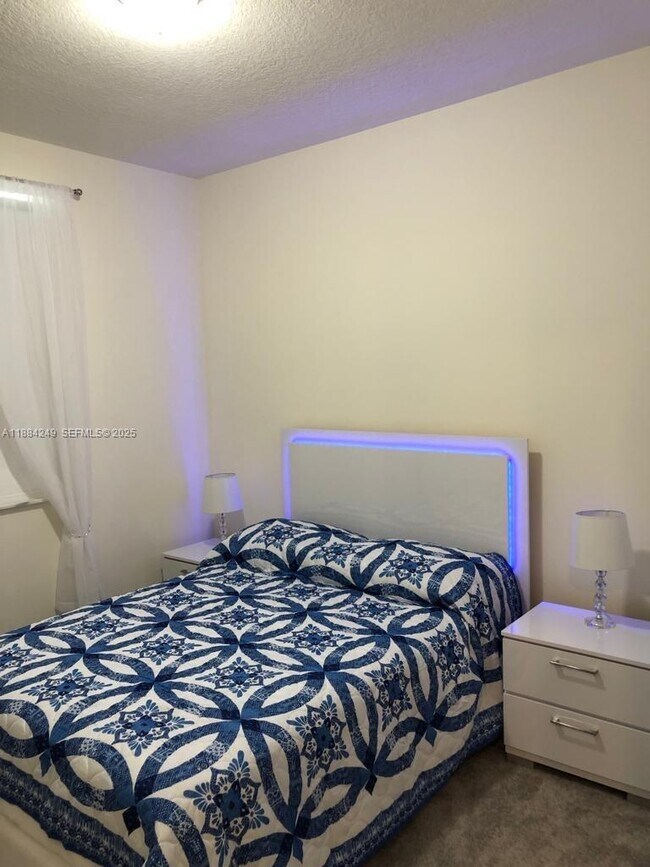 Building Photo - 6416 NW 102nd Ct