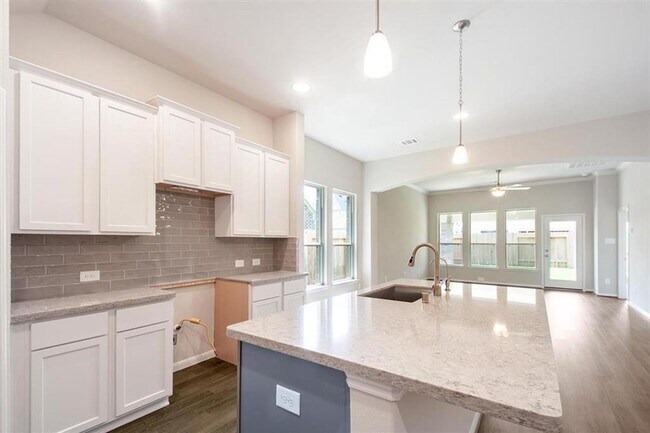 Building Photo - AVAILABLE NOW! This  3 bedroom, 2.5 bath, 1.5 story home is located in the convenient location of...