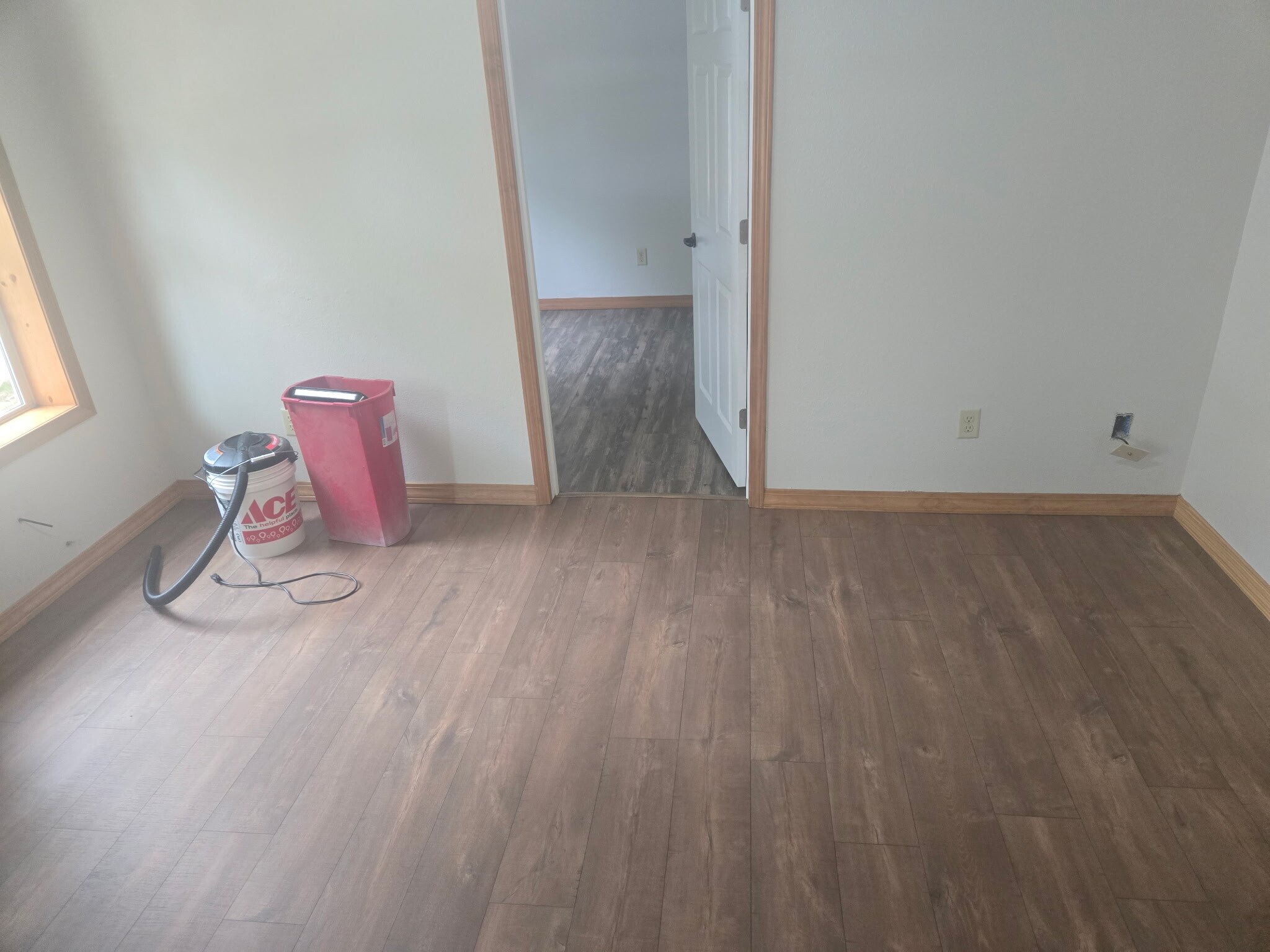 living room looking into bedroom # - 1009 S 9th St