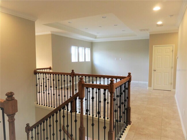 Building Photo - 8828 Tropical Palm Dr