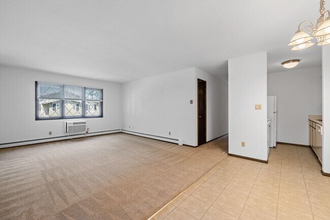 Building Photo - 2 Bedroom/1.5 Bathroom Upper available at our Cedar View Apartments