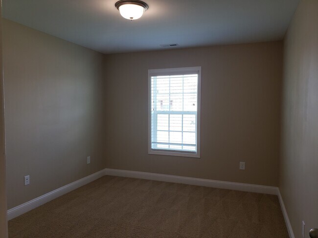 Building Photo - Practically New Home w/Fenced Back Yard Lo...